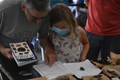 father and daughter reading list of species