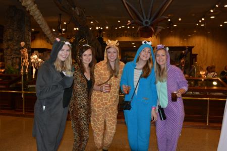 Girls in animal onesies