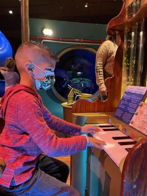 boy playing piano